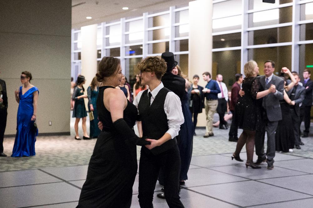 Two students swing dancing at Presidents' Ball